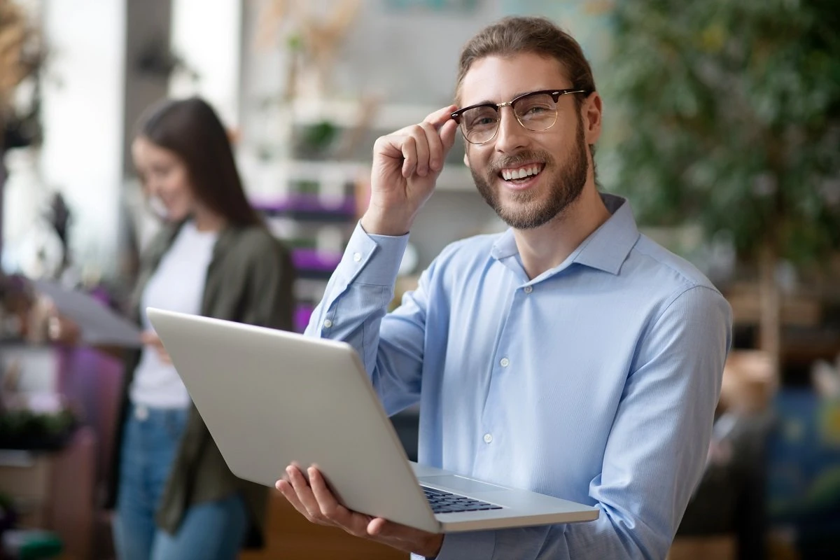 Man with a laptop showcasing his relevant experience