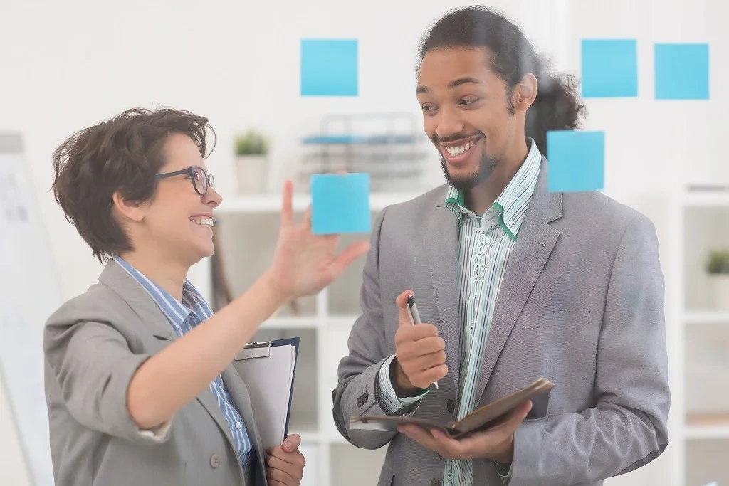 two employees portraying professionalism in the workplace